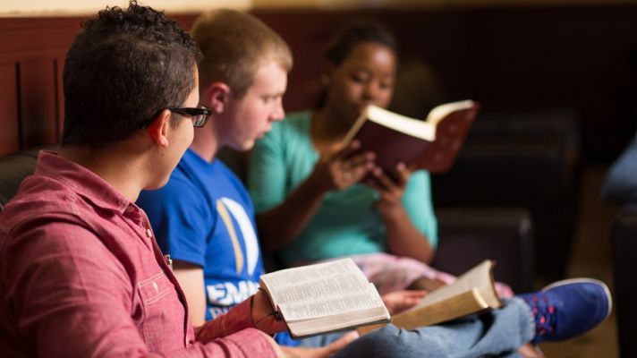Students studying bible